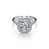 Tiffany & Co. Tiffany Soleste® cushion-cut engagement ring with a diamond band in platinum. | ^ Engagement Rings