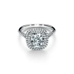Tiffany & Co. Tiffany Soleste® cushion-cut engagement ring with a diamond band in platinum. | ^ Engagement Rings