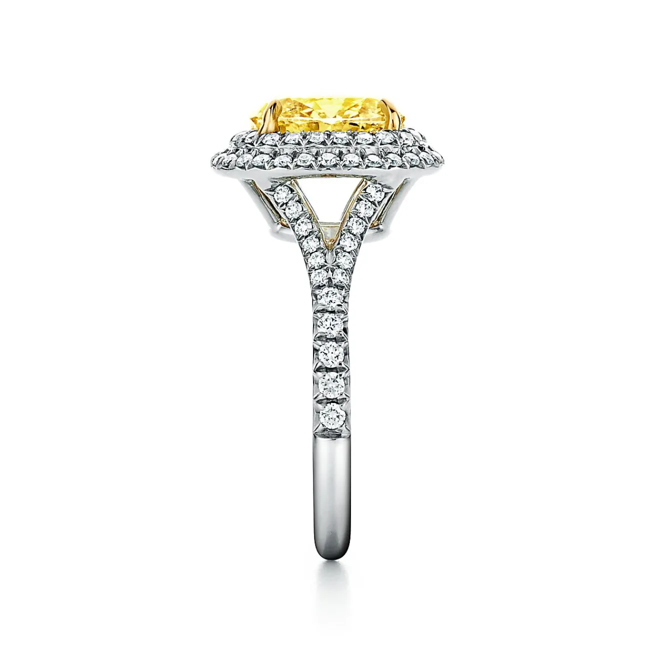 Tiffany & Co. Tiffany Soleste® oval yellow diamond double halo engagement ring in platinum. | ^ Engagement Rings