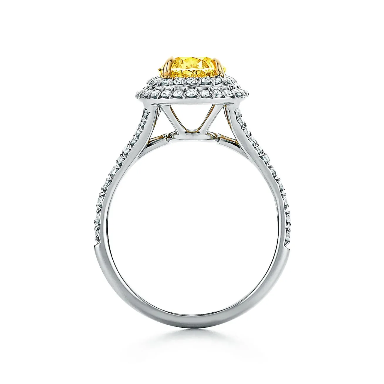 Tiffany & Co. Tiffany Soleste® oval yellow diamond double halo engagement ring in platinum. | ^ Engagement Rings