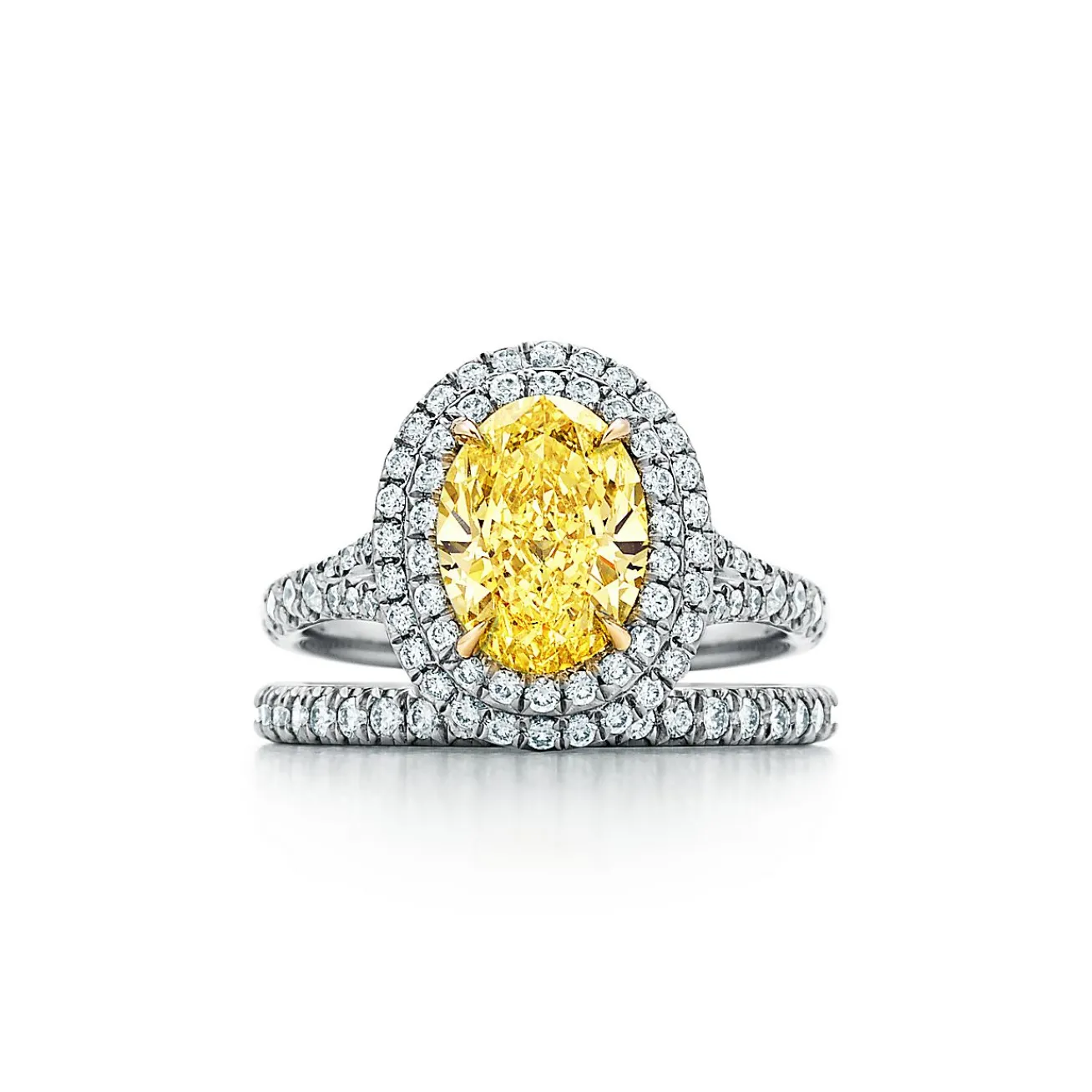 Tiffany & Co. Tiffany Soleste® oval yellow diamond double halo engagement ring in platinum. | ^ Engagement Rings