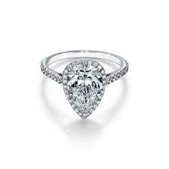 Tiffany & Co. Tiffany Soleste® pear-shaped halo engagement ring with a diamond platinum band. | ^ Engagement Rings