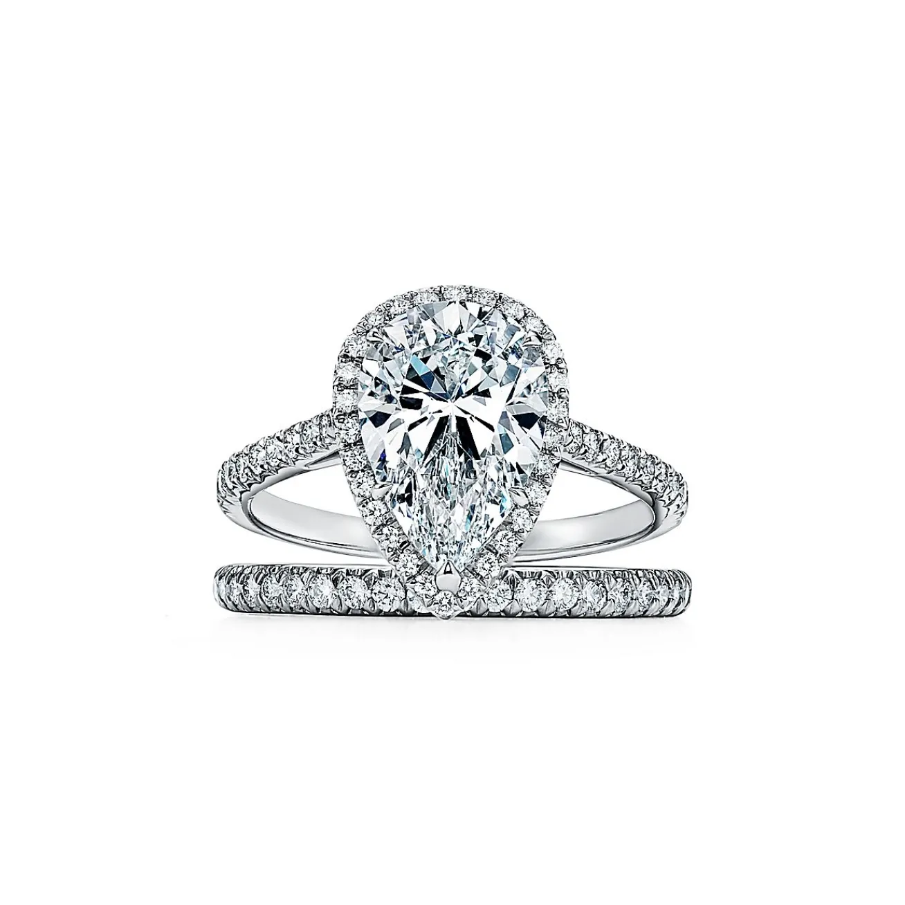 Tiffany & Co. Tiffany Soleste® pear-shaped halo engagement ring with a diamond platinum band. | ^ Engagement Rings