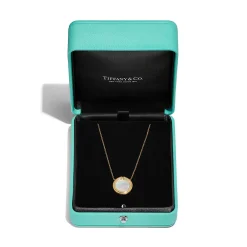 Tiffany & Co. Tiffany T diamond and mother-of-pearl circle pendant in 18k gold. | ^ Necklaces & Pendants|Gold Jewelry