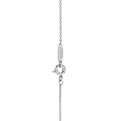 Tiffany & Co. Tiffany T diamond pendant in 18k white gold with a baguette diamond. | ^ Necklaces & Pendants|Diamond Jewelry