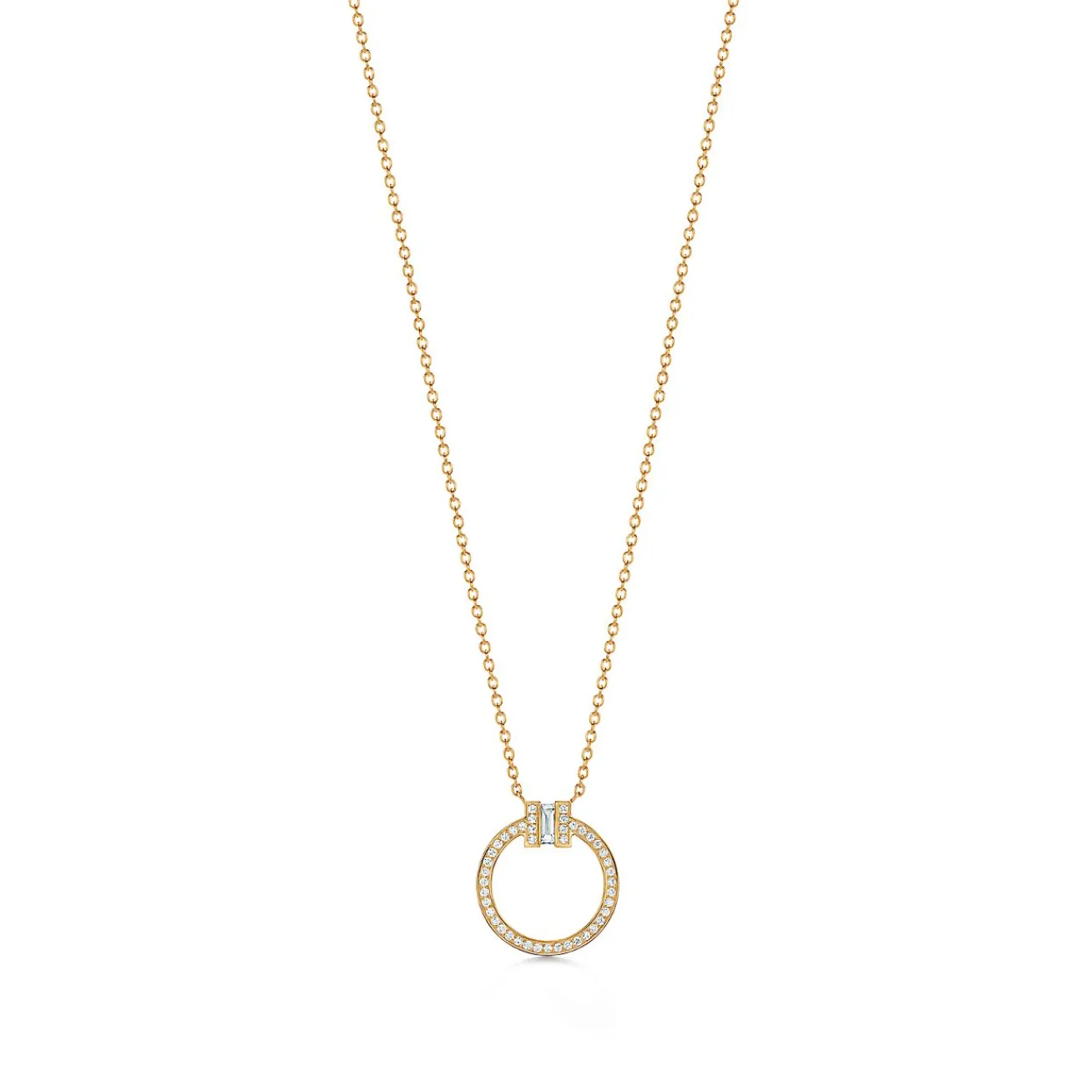 Tiffany & Co. Tiffany T diamond pendant in 18k gold with a baguette diamond. | ^ Necklaces & Pendants|Gold Jewelry