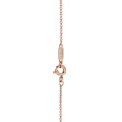 Tiffany & Co. Tiffany T diamond pendant in 18k rose gold with a baguette diamond. | ^ Necklaces & Pendants|Rose Gold Jewelry