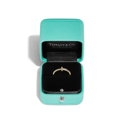 Tiffany & Co. Tiffany T diamond wire band ring in 18k gold. | ^ Rings|Men's Jewelry