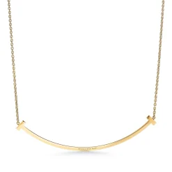 Tiffany & Co. Tiffany T extra large smile pendant in 18k gold. | ^ Necklaces & Pendants|Men's Jewelry
