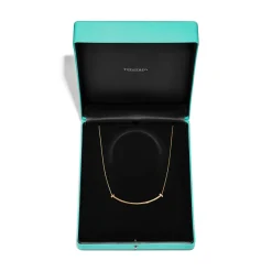 Tiffany & Co. Tiffany T extra large smile pendant in 18k gold. | ^ Necklaces & Pendants|Men's Jewelry