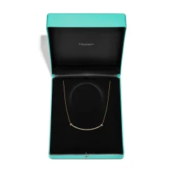 Tiffany & Co. Tiffany T extra large smile pendant in 18k gold with diamonds. | ^ Necklaces & Pendants|Men's Jewelry
