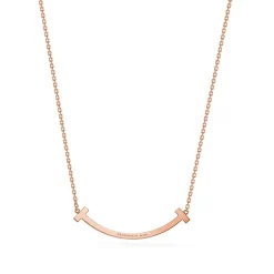 Tiffany & Co. Tiffany T medium smile pendant in 18k rose gold with diamonds. | ^ Necklaces & Pendants|Rose Gold Jewelry