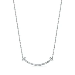 Tiffany & Co. Tiffany T medium smile pendant in 18k white gold with diamonds. | ^ Necklaces & Pendants|Gifts for Her