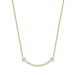 Tiffany & Co. Tiffany T medium smile pendant in 18k gold with diamonds. | ^ Necklaces & Pendants|Gold Jewelry