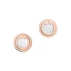 Tiffany & Co. Tiffany T mother-of-pearl circle earrings in 18k rose gold. | ^ Earrings|Rose Gold Jewelry