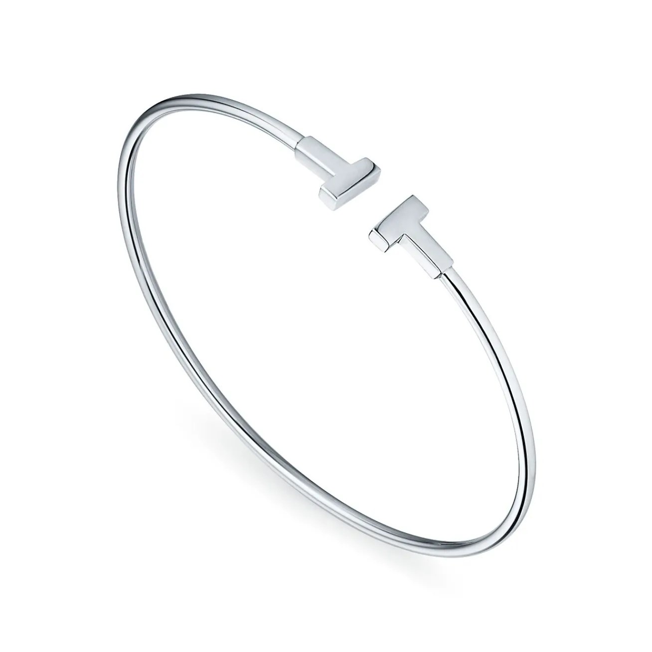 Tiffany & Co. Tiffany T narrow wire bracelet in 18k white gold, medium. | ^ Bracelets|Men's Jewelry