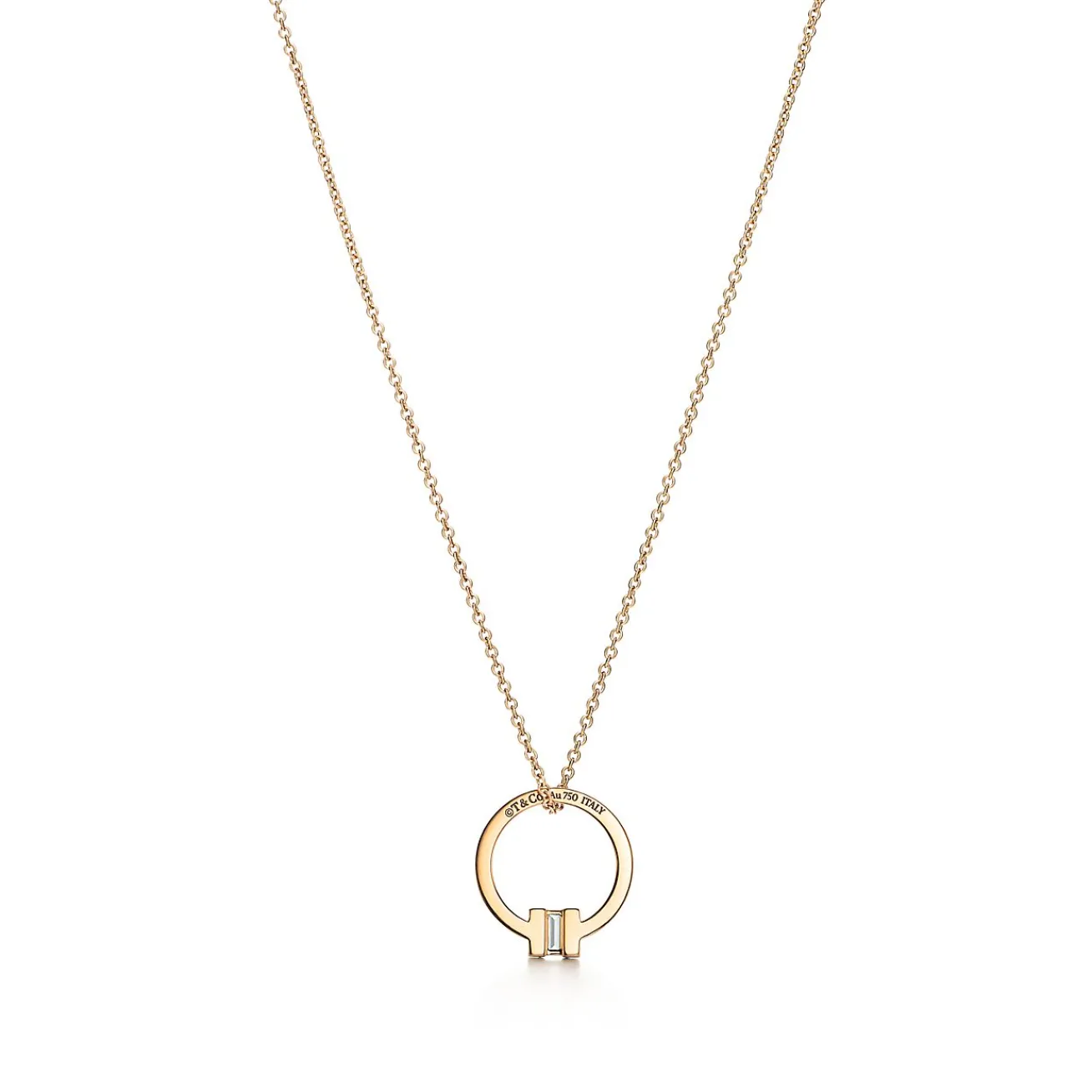 Tiffany & Co. Tiffany T pendant in 18k gold with a baguette diamond. | ^ Necklaces & Pendants|Men's Jewelry