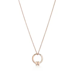 Tiffany & Co. Tiffany T pendant in 18k rose gold with a baguette diamond. | ^ Necklaces & Pendants|Men's Jewelry