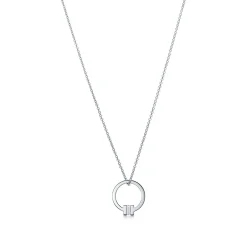 Tiffany & Co. Tiffany T pendant in 18k white gold with a baguette diamond. | ^ Necklaces & Pendants|Men's Jewelry