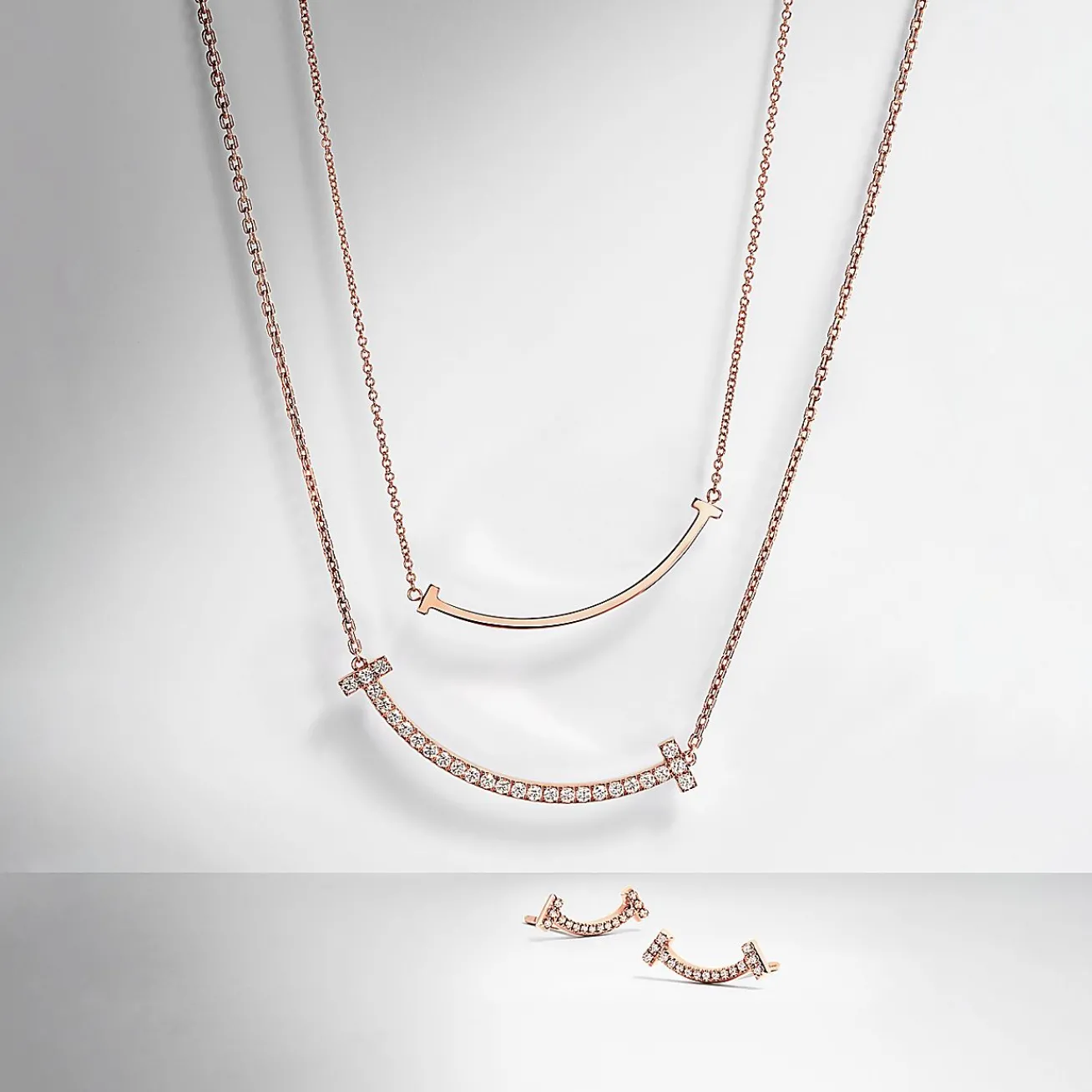 Tiffany & Co. Tiffany T smile earrings in 18k rose gold with diamonds. | ^ Earrings|Dainty Jewelry