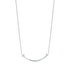 Tiffany & Co. Tiffany T smile pendant in 18k white gold with pink sapphires, small. | ^ Necklaces & Pendants|Colored Gemstone Jewelry