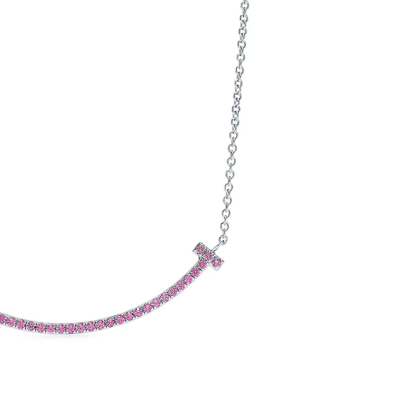 Tiffany & Co. Tiffany T smile pendant in 18k white gold with pink sapphires, small. | ^ Necklaces & Pendants|Colored Gemstone Jewelry