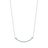 Tiffany & Co. Tiffany T smile pendant in 18k white gold with blue topazes, small. | ^ Necklaces & Pendants|Colored Gemstone Jewelry