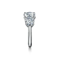 Tiffany & Co. Tiffany Three Stone engagement ring in platinum: an expression of eternal love. | ^ Engagement Rings