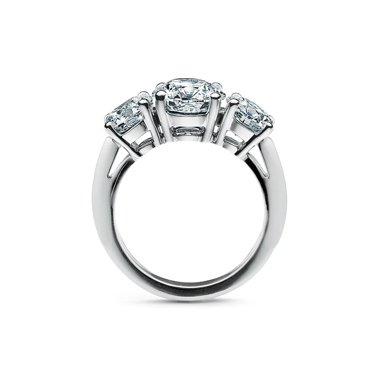 Tiffany & Co. Tiffany Three Stone engagement ring in platinum: an expression of eternal love. | ^ Engagement Rings
