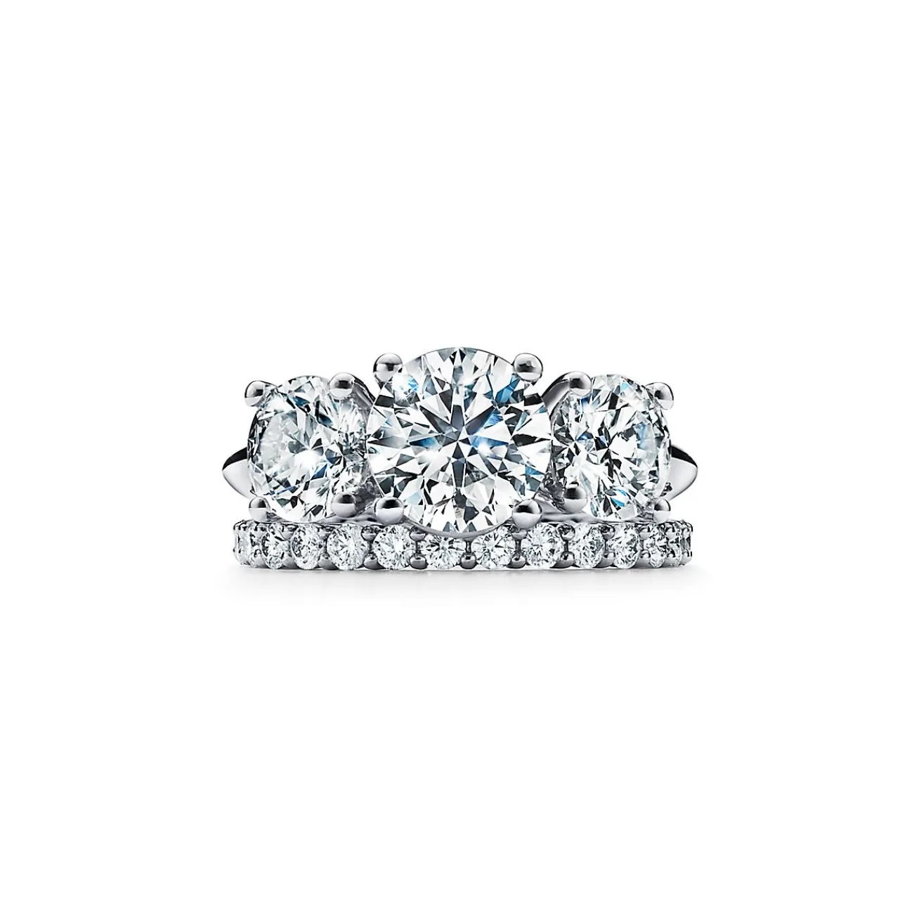 Tiffany & Co. Tiffany Three Stone engagement ring in platinum: an expression of eternal love. | ^ Engagement Rings