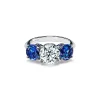 Tiffany & Co. Tiffany Three Stone engagement ring with sapphire side stones in platinum. | ^ Engagement Rings