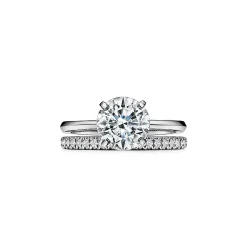 Tiffany & Co. Tiffany True® round brilliant engagement ring: an icon of modern love. | ^ Engagement Rings
